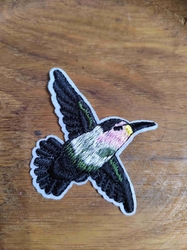 Nažehlovačka ptáček černozelený