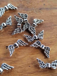 Ozdobný díl křídla 7x15 mm barva platina s patinou