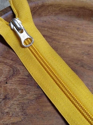 Zip spirálový šíře 5 mm délka 16 cm žlutá tmavá