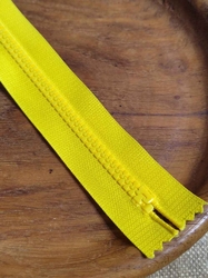 Zip kostěný šíře 5 mm délka 16 cm žlutá
