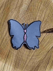Nažehlovačka reflexní motýl
