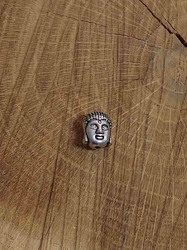 Kovový korálek buddha