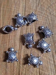Kovový korálek želva 10x14 mm barva platina