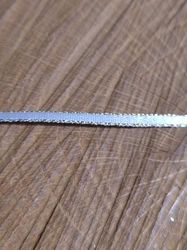 Stuha atlasová oboulící s rexorem šíře 3mm barva bílá zlatá