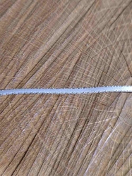 Stuha atlasová oboulící s rexorem šíře 3mm barva bílá stříbrná