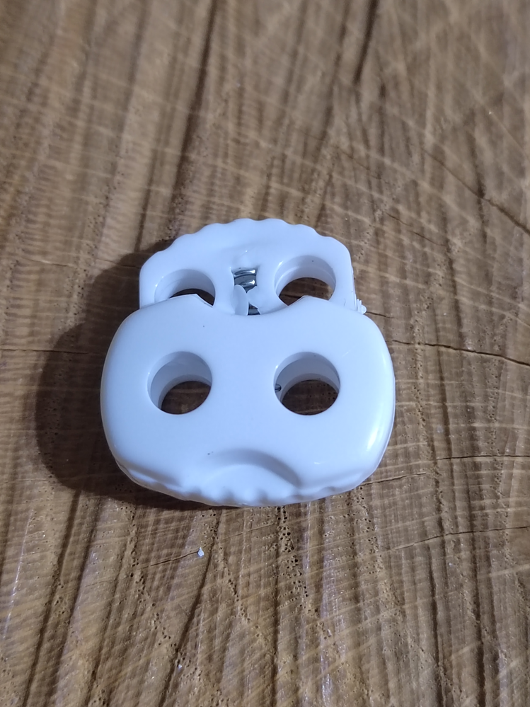 Brzdičky dvoudírkové 20 mm barva bílá
